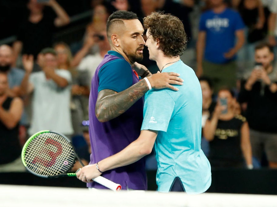 Nick Kyrgios and Ugo Humbert embrace after the match