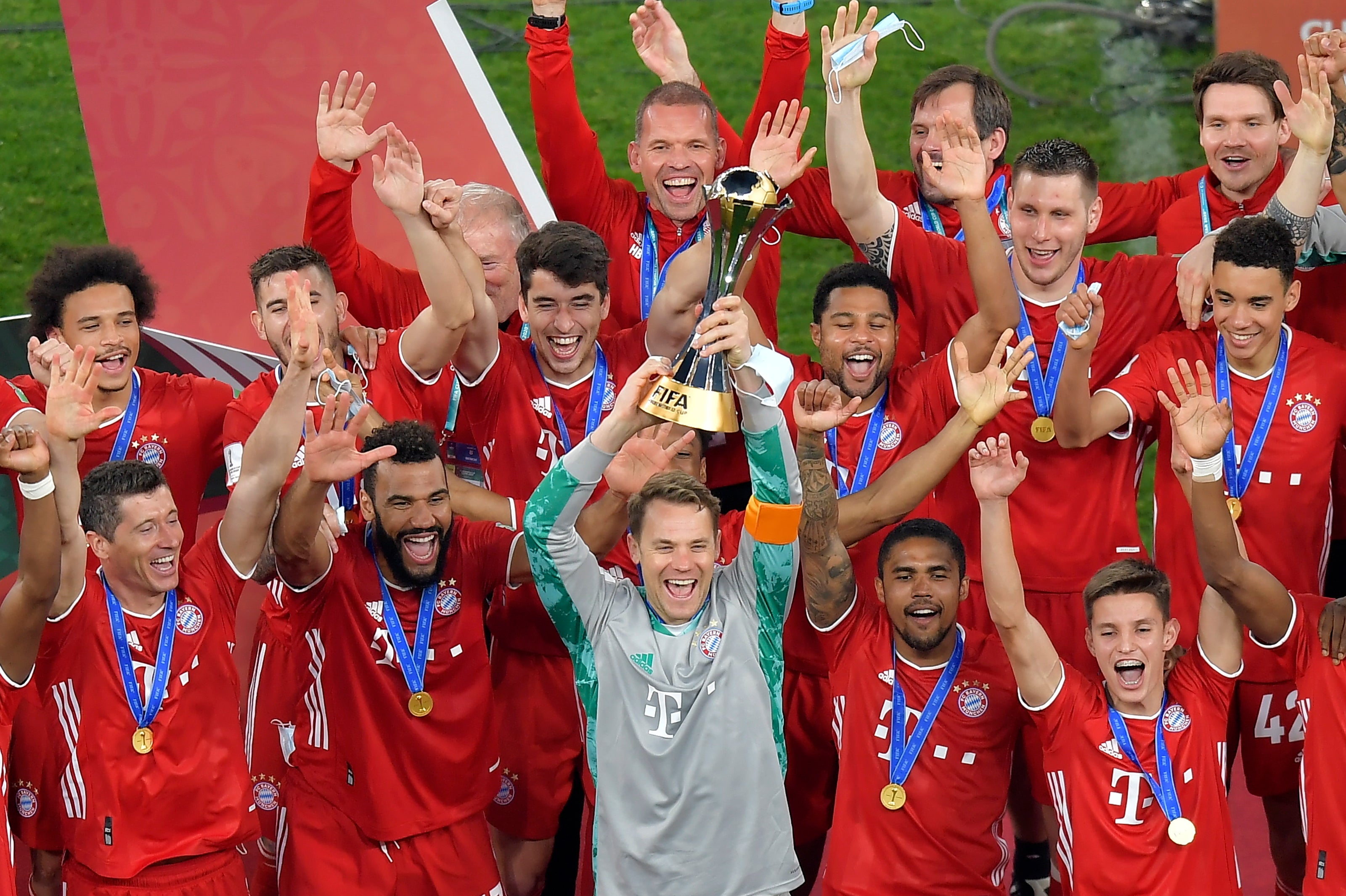 Bayern Munich players celebrate with the Club World Cup trophy