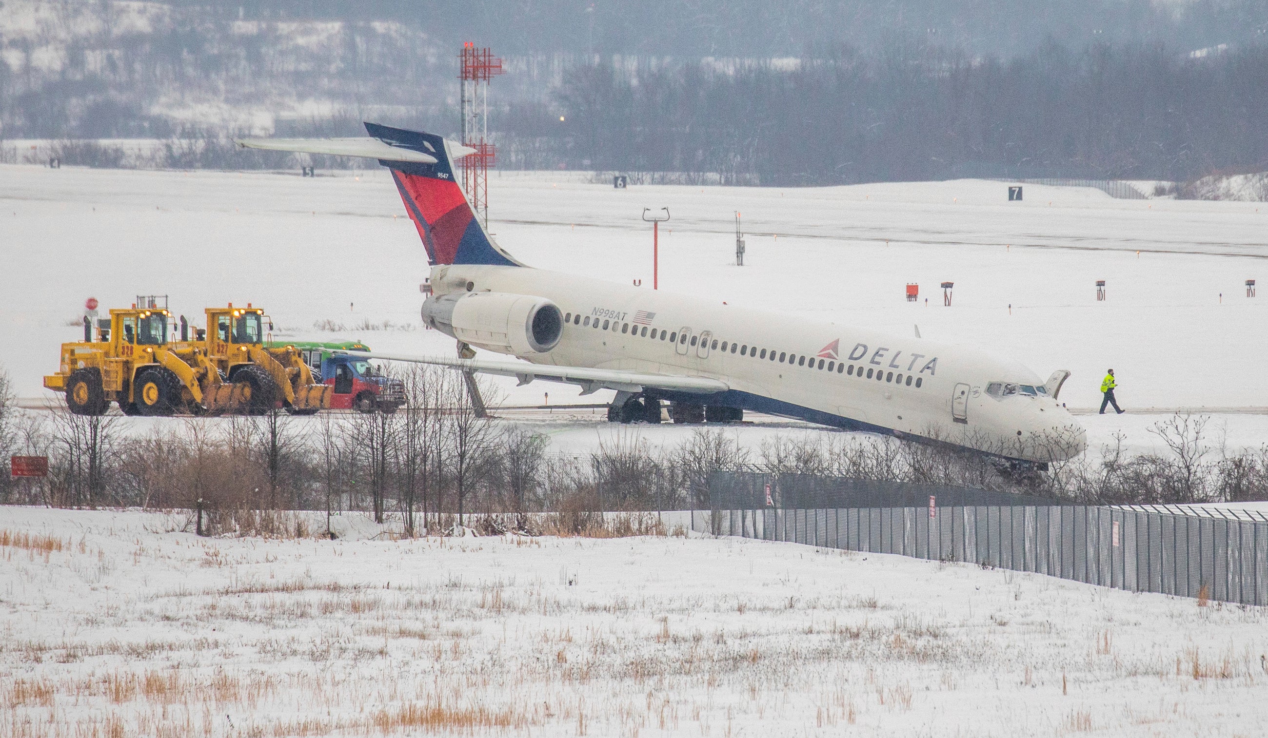 Plane Slides Off Runway