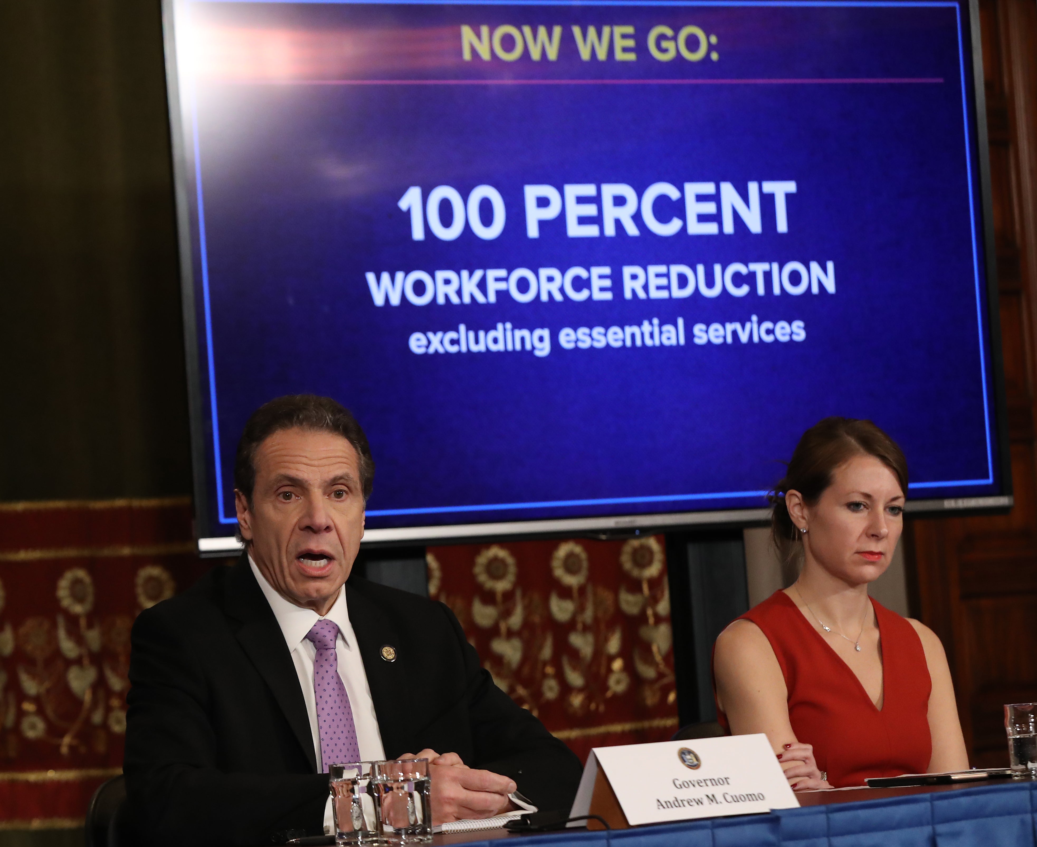 File Image: New York Governor Andrew Cuomo (L) speaks during his daily news conference with Secretary to the Governor Melissa DeRosa (R) on 20 March 2020 in New York City.