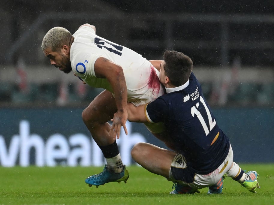 Ollie Lawrence in action against Scotland