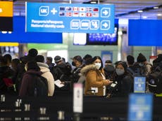 Travellers returning before launch of quarantine hotels queue for up to four hours at Heathrow Airport 