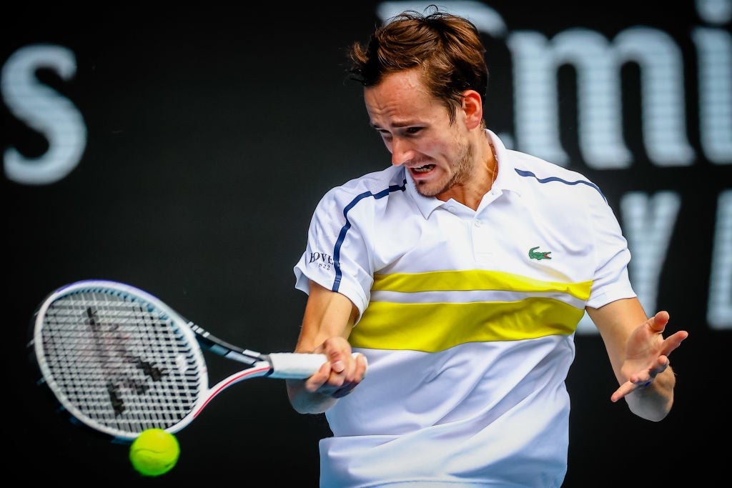 Medvedev hits a forehand in Melbourne during his third round match