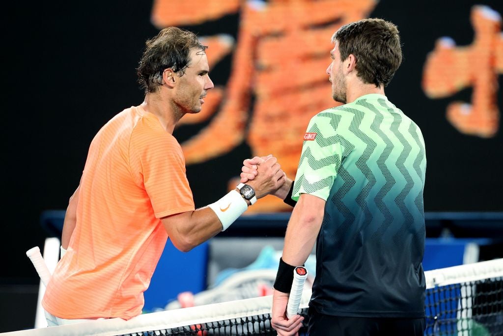 Spain’s Rafael Nadal shakes hands with Britain’s Cameron Norrie