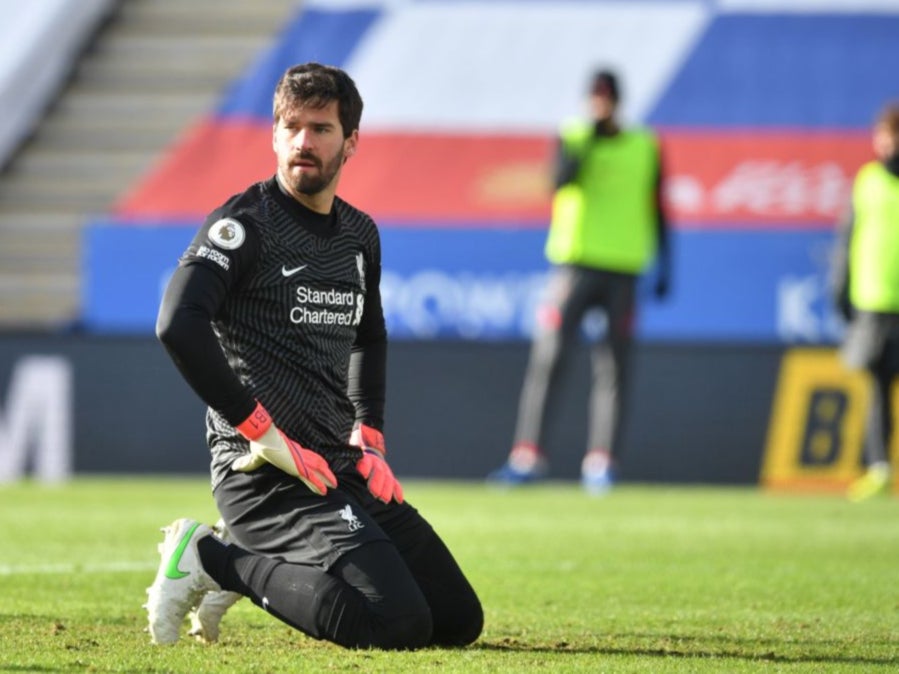 Alisson reacts to his error