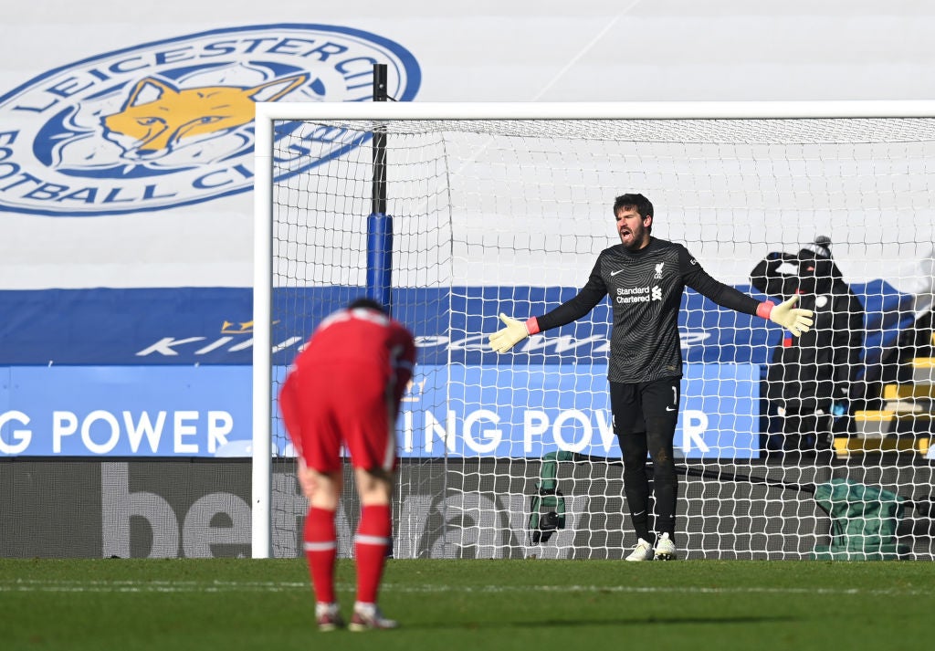 Alisson of Liverpool reacts after conceding a third goal