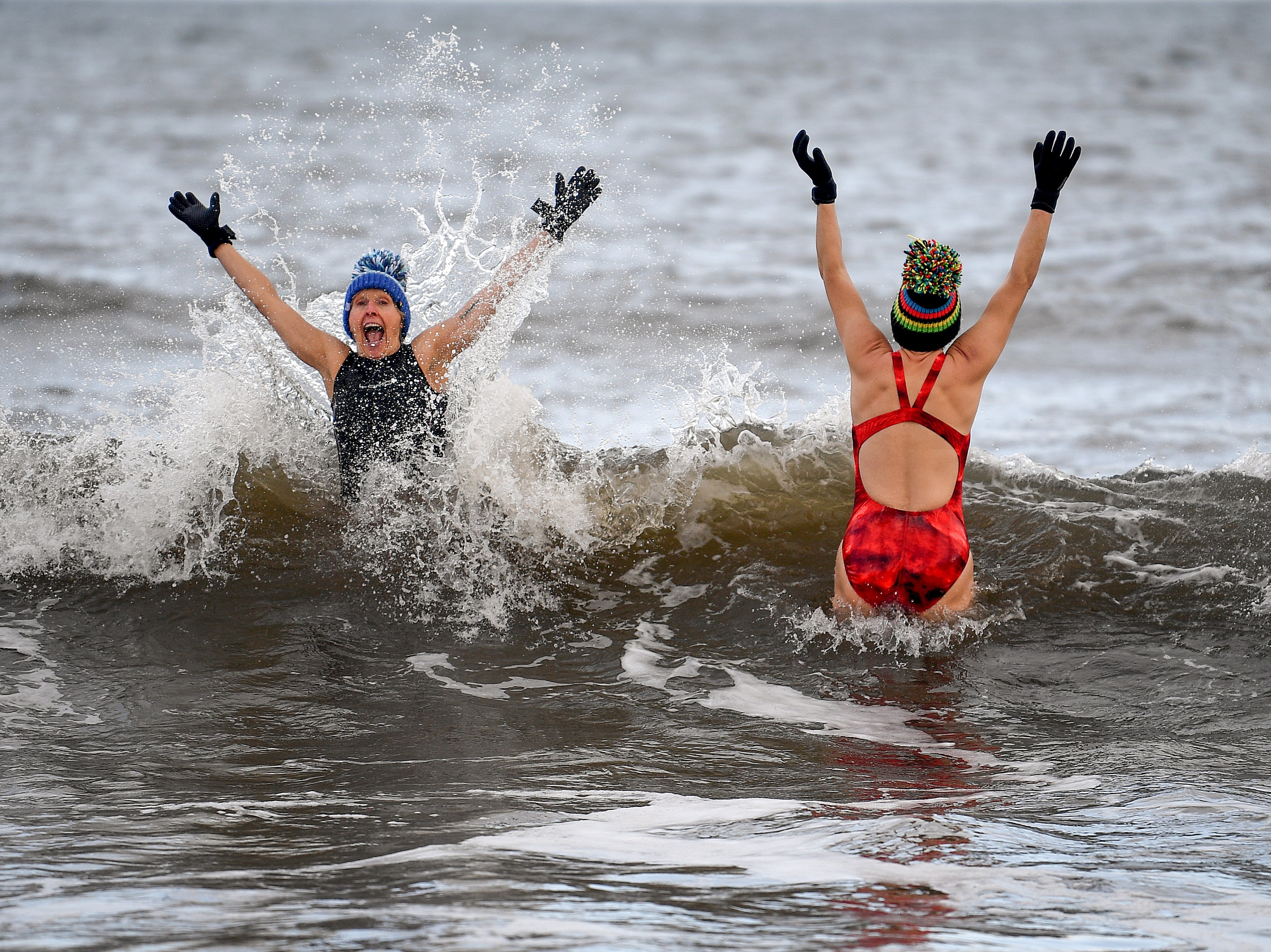 UK weather: Freezing rain and 80mph winds in store as cold snap eases