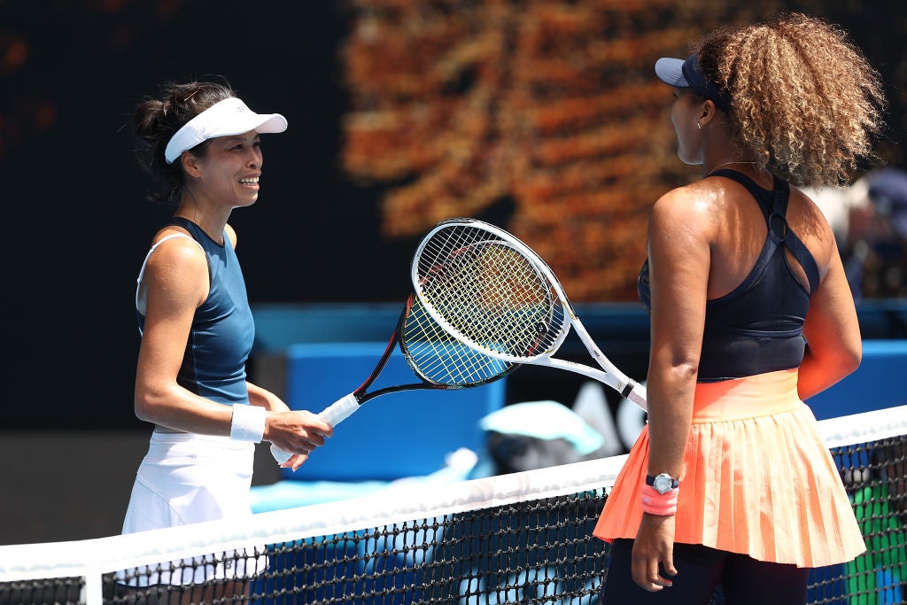 Naomi Osaka and Hsieh Su-Wei embrace at the net after their match