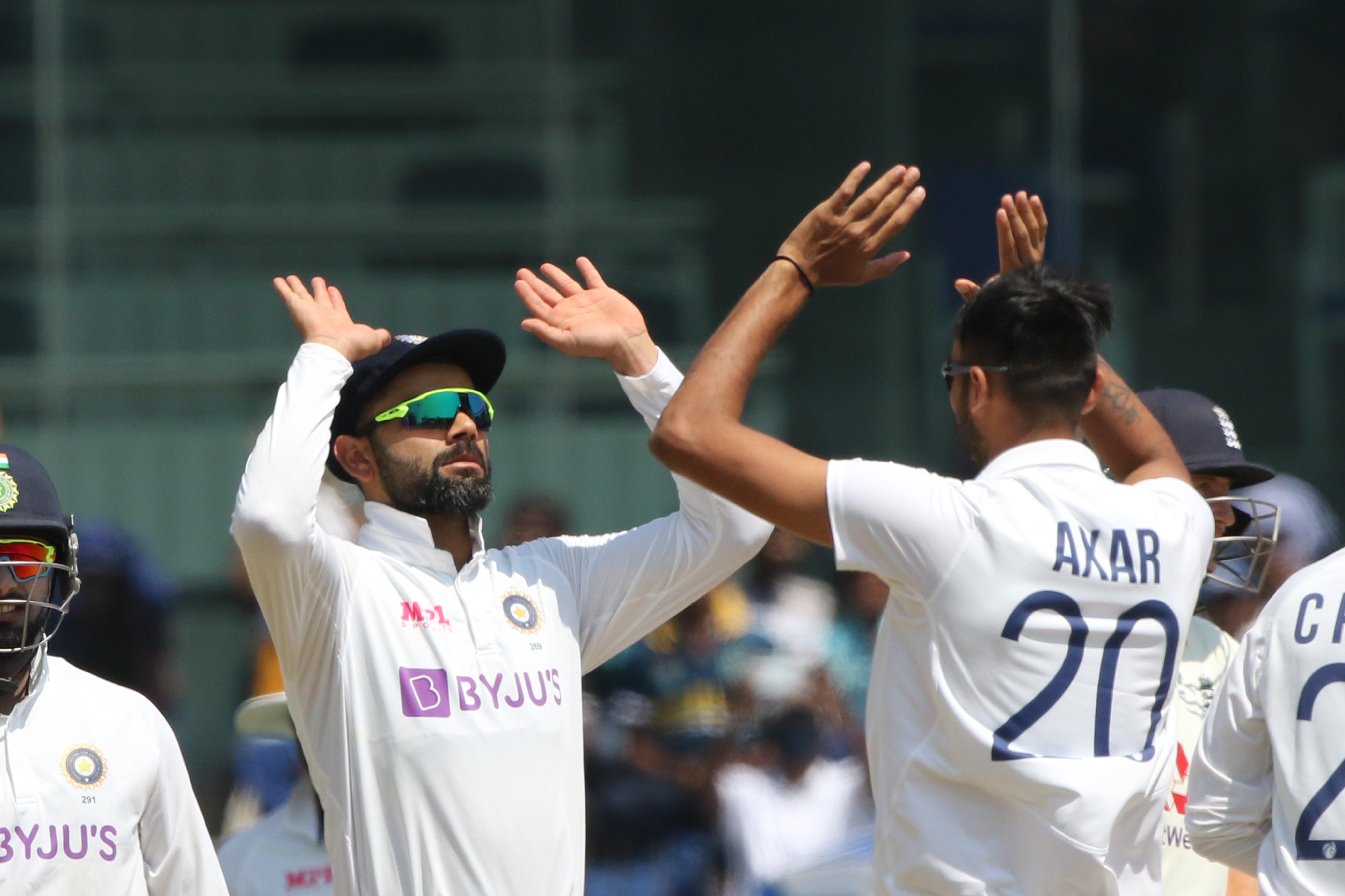 Axar Patel celebrates with Virat Kohli