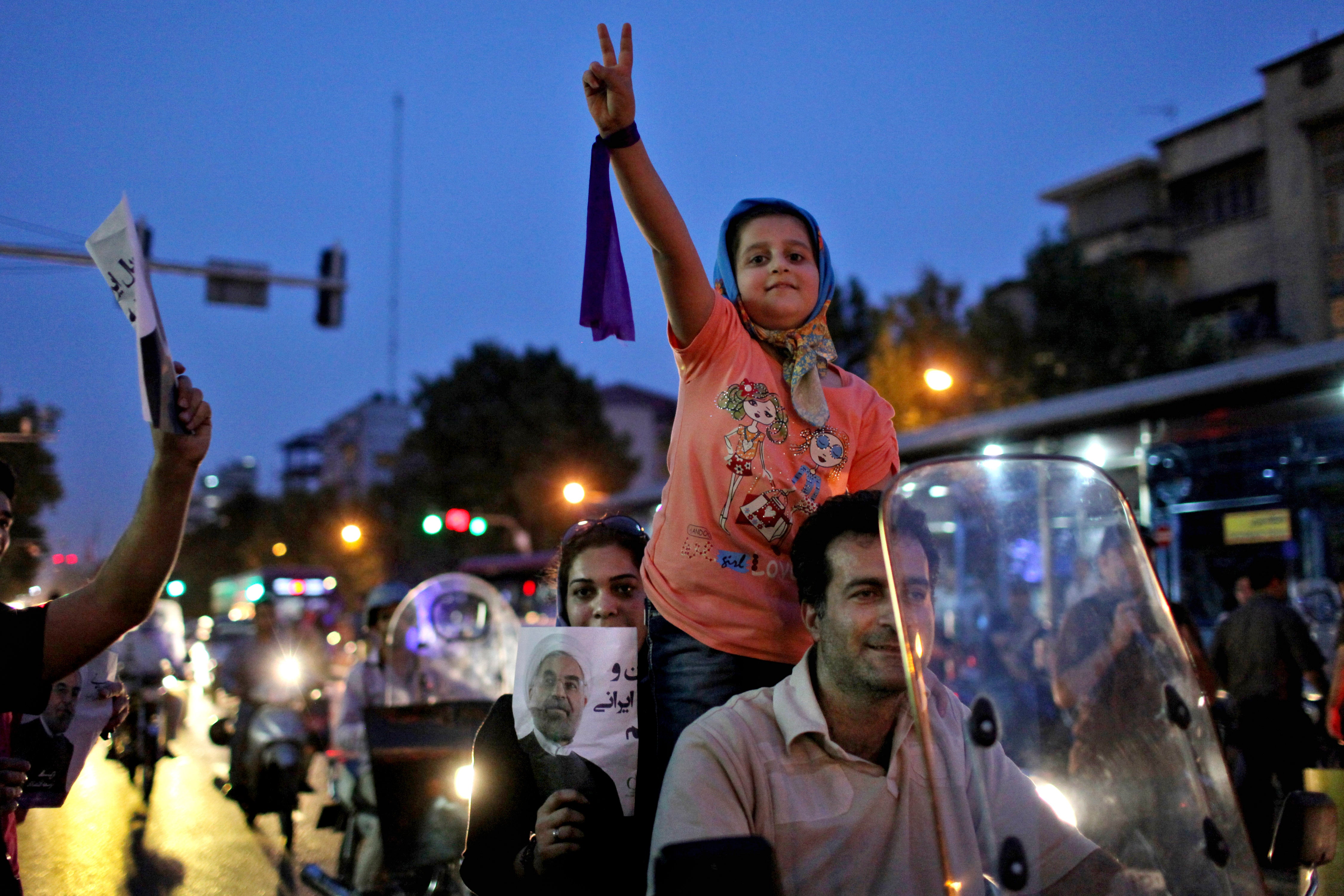 Supporters of the moderate Hassan Rouhani ahead of the presidential election in 2013