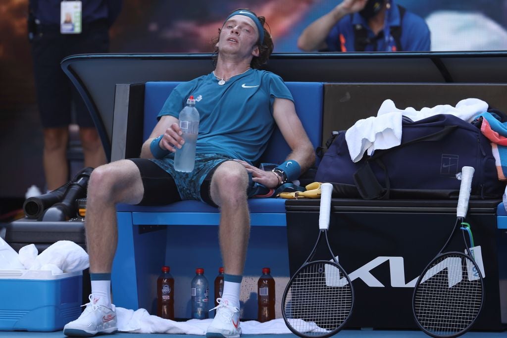 Andrey Rublev appears exhausted between games in his quarter-final versus Daniil Medvedev