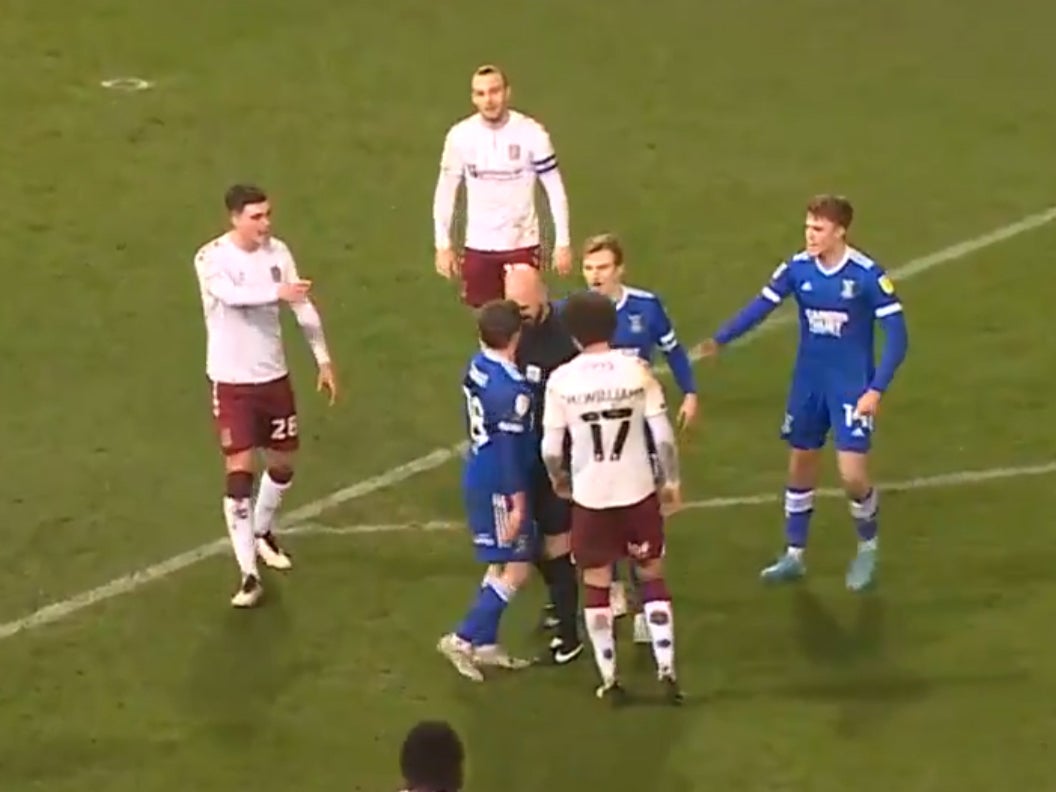 Referee Darren Drysdale was involved in an apparent confrontation with Ipswich midfielder Alan Judge