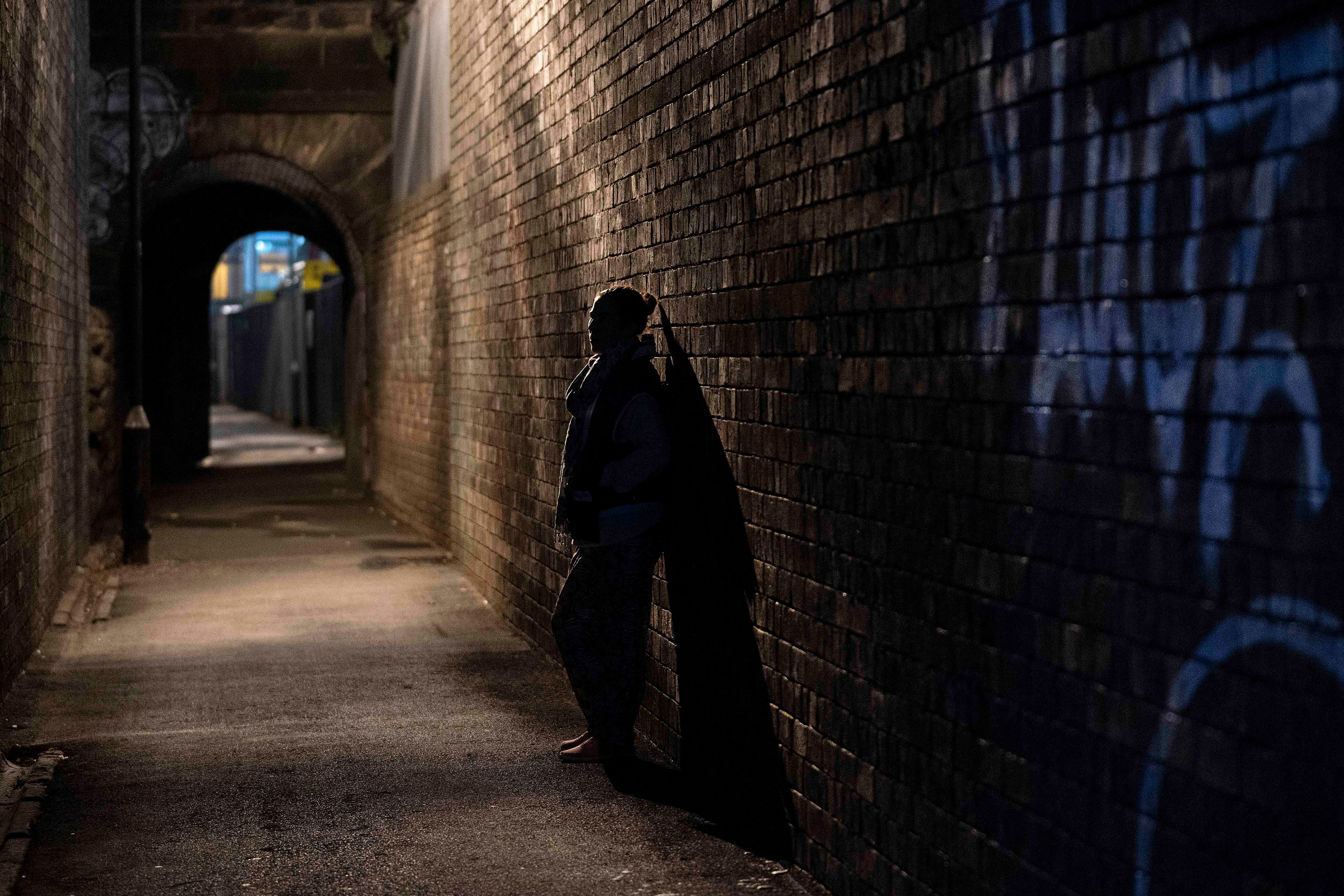 A sex worker waits for a customer on the streets of Holbeck, the only ‘managed’ zone for prostitution in the UK