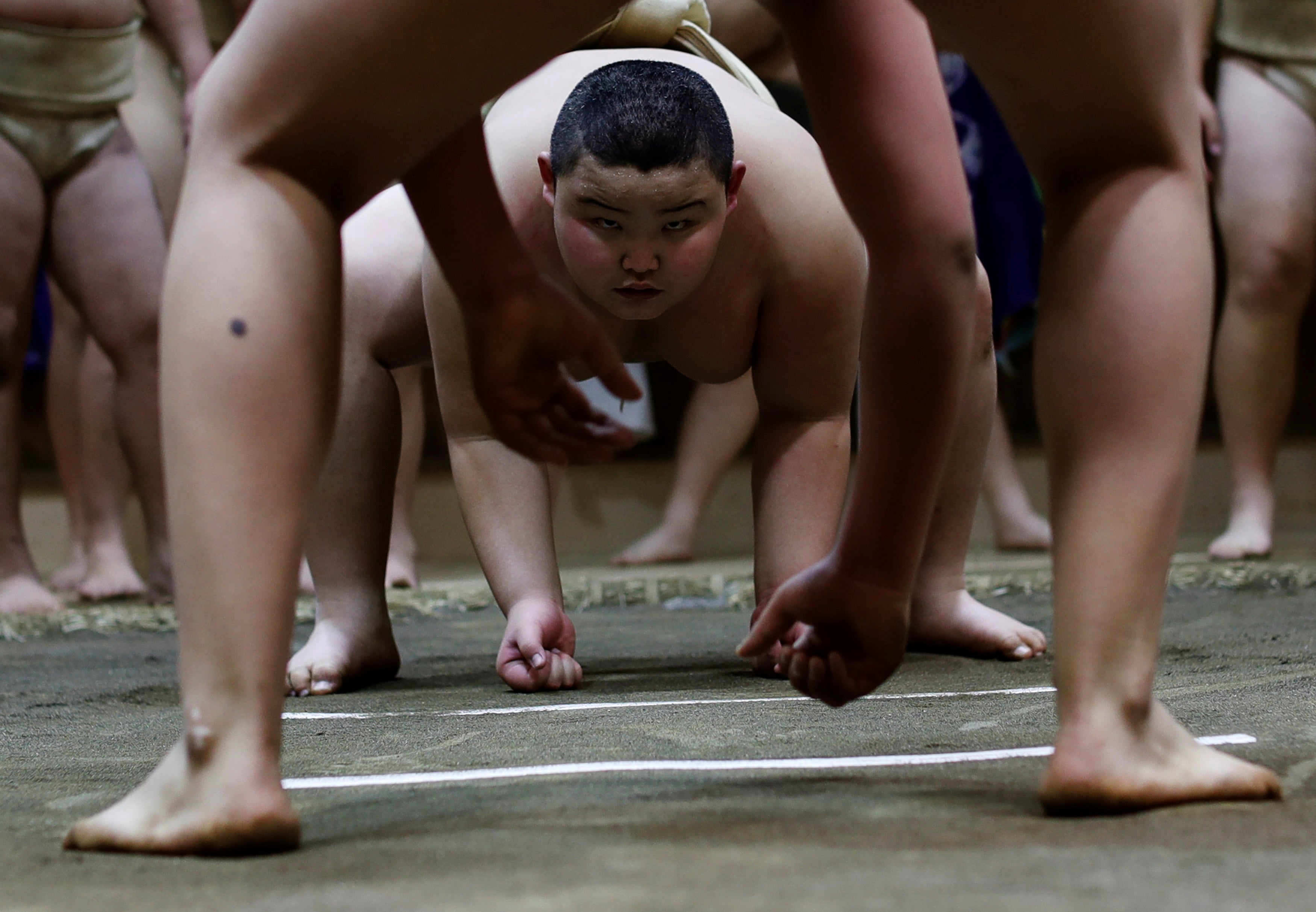 Kyuta trains on a Dohyo, a traditional ring in which sumo wrestling bouts are held, at Komatsuryu Sumo Club