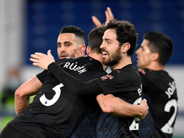 Manchester City celebrate Bernardo Silva’s goal against Everton