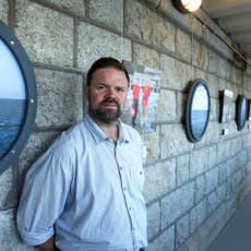 Journalist fined for Covid breach after photographing protest outside army barracks housing asylum seekers