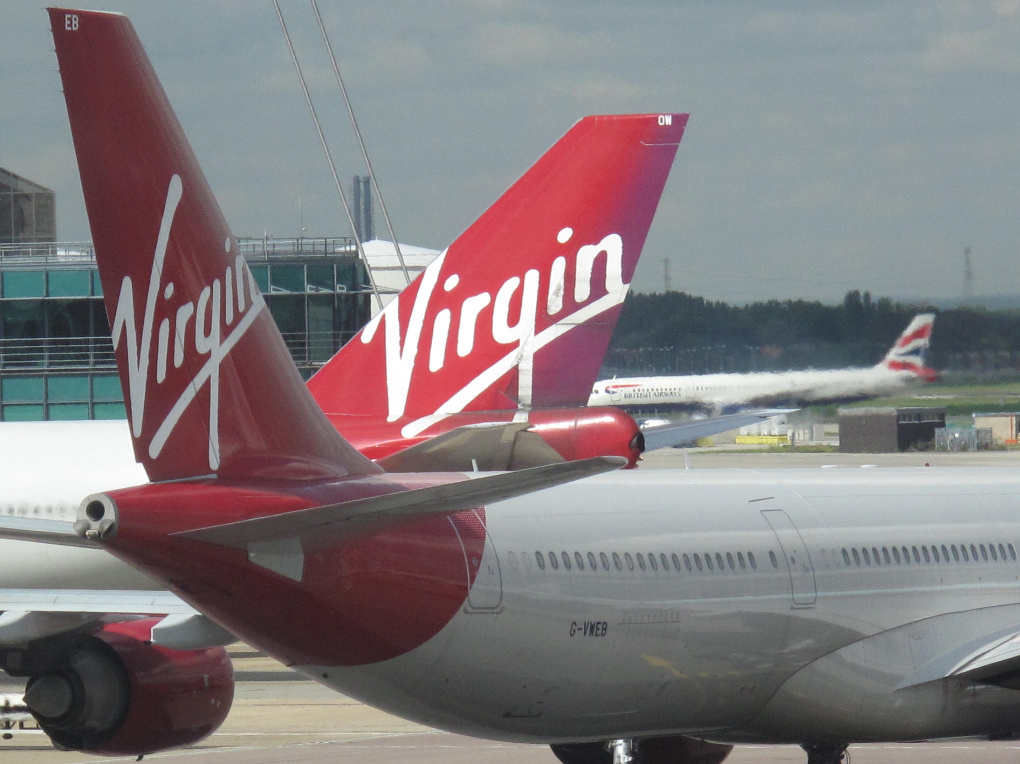 Better times: Virgin Atlantic and British Airways aircraft before the coronavirus pandemic