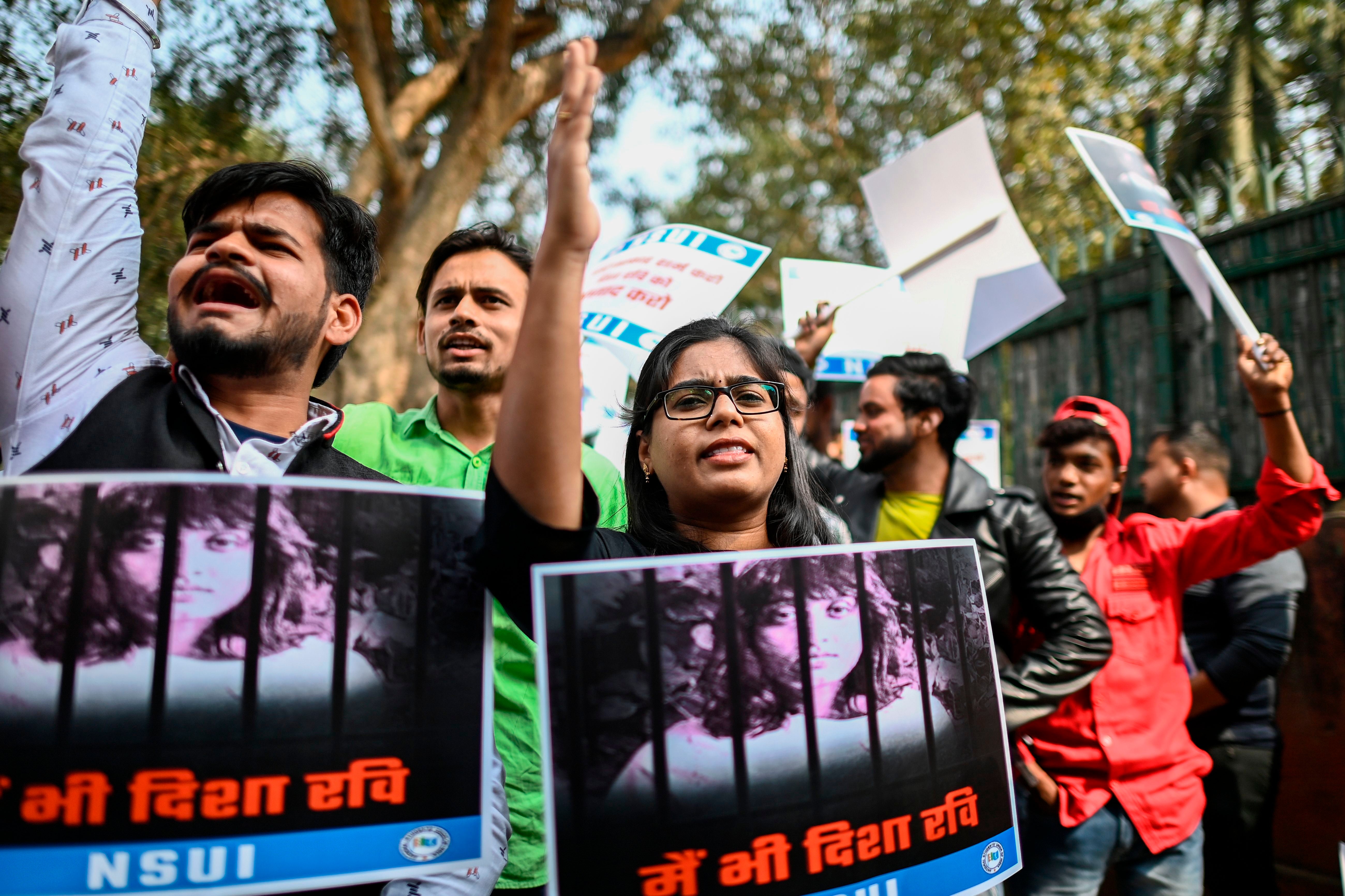 Activists from the National Students' Union of India (NSUI) protest against the arrest of Disha Ravi during a demonstration in New Delhi, on 17 February 2021