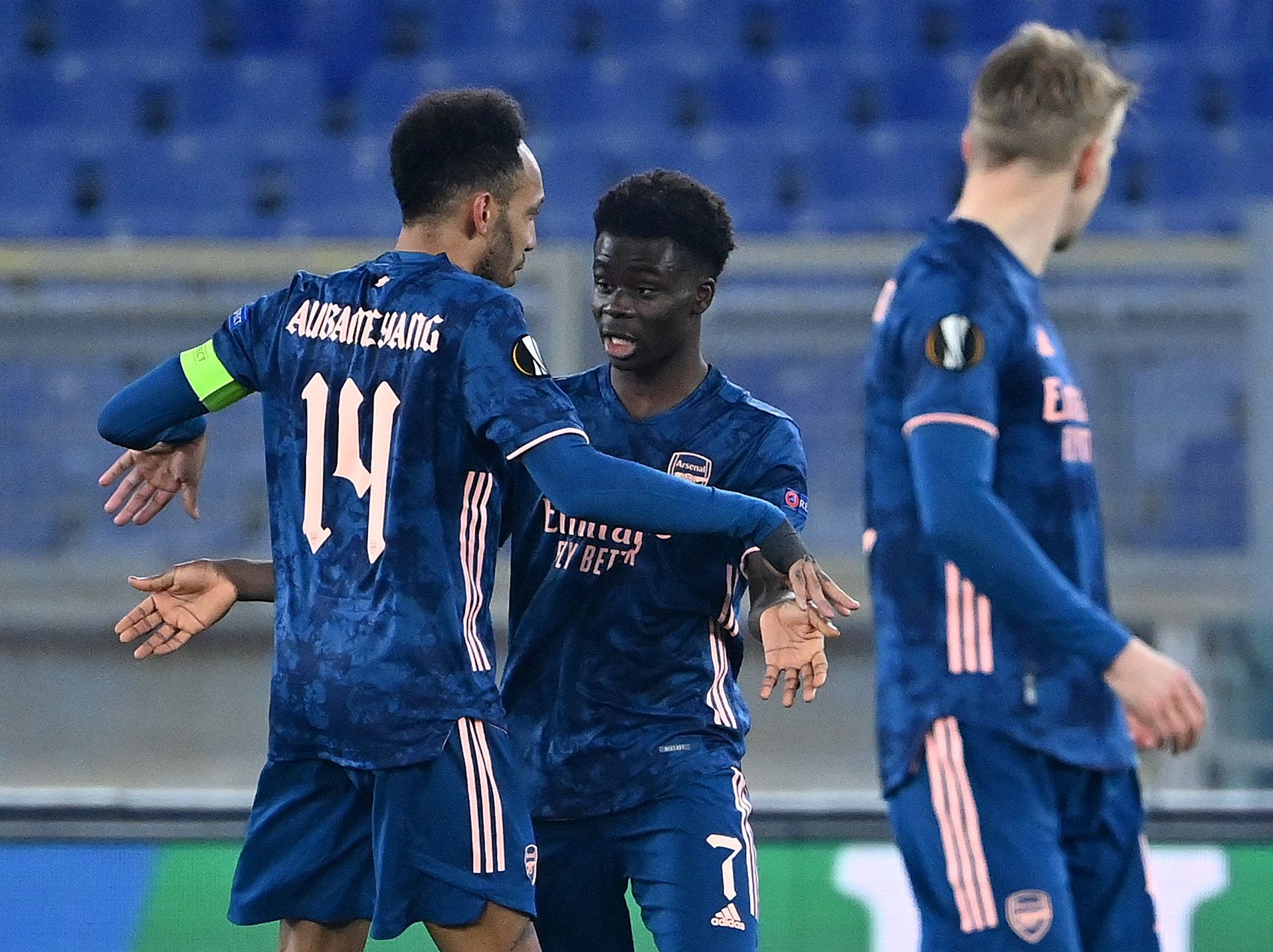 Bukayo Saka (centre) scored for Arsenal in the first leg