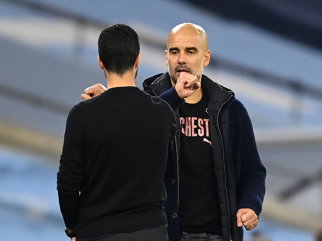 Man City manager Pep Guardiola and Arsenal manager Mikel Arteta