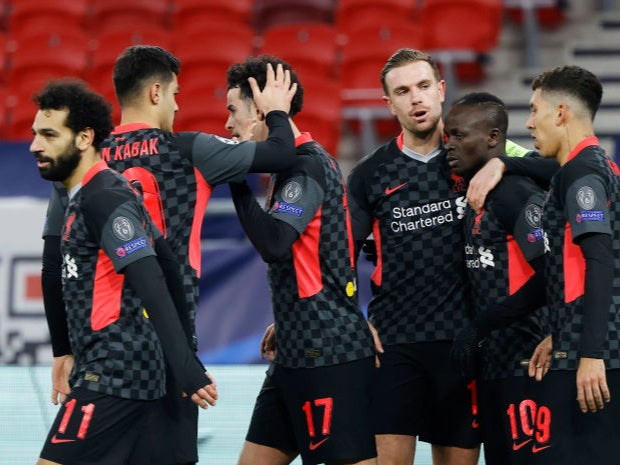 Sadio Mane of Liverpool celebrates with teammates