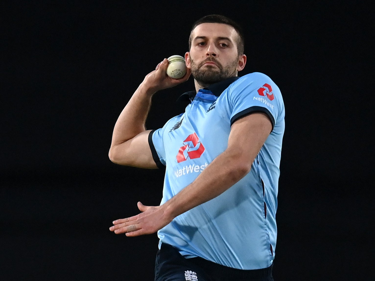 Mark Wood of England bowls