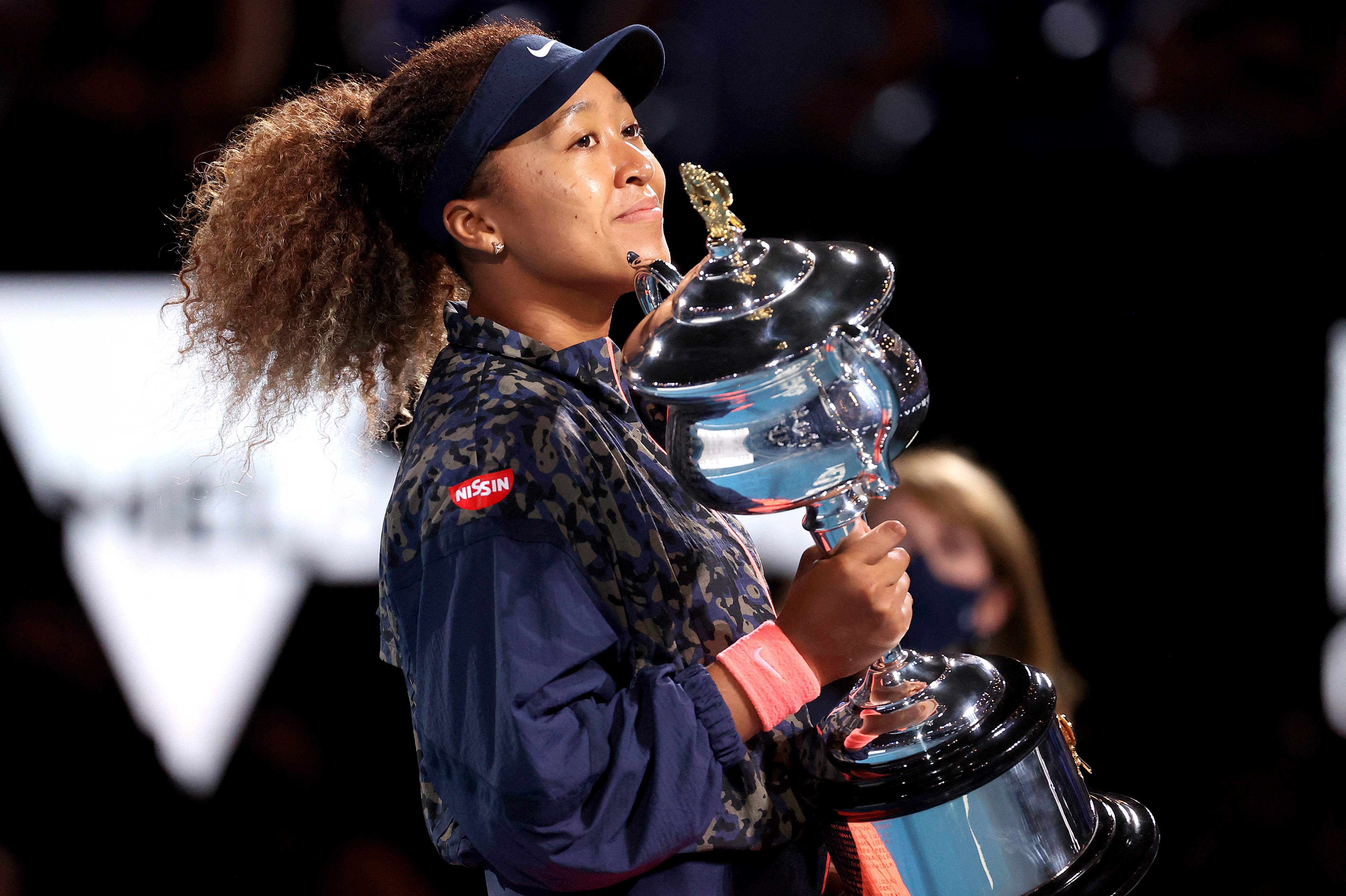 Naomi Osaka clutches the Australian Open trophy