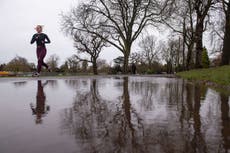 UK weather: Flood alerts issued as heavy rain and gales batter Britain