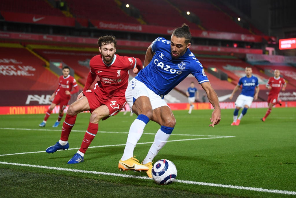 Dominic Calvert-Lewin in action under pressure from Nathaniel Phillips