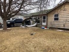 Passenger jet lands safely after suspected engine explosion rains debris on Denver neighbourhoods