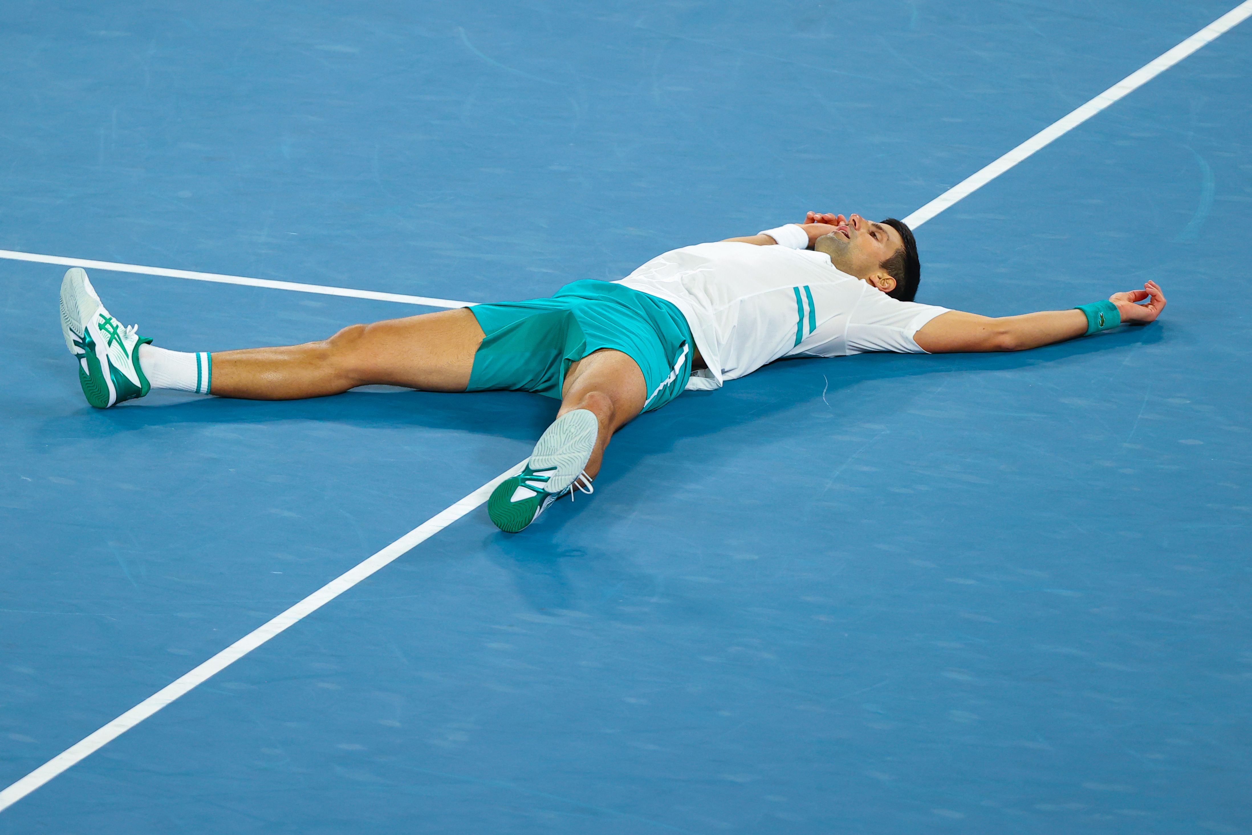 Djokovic reacts after winning match point