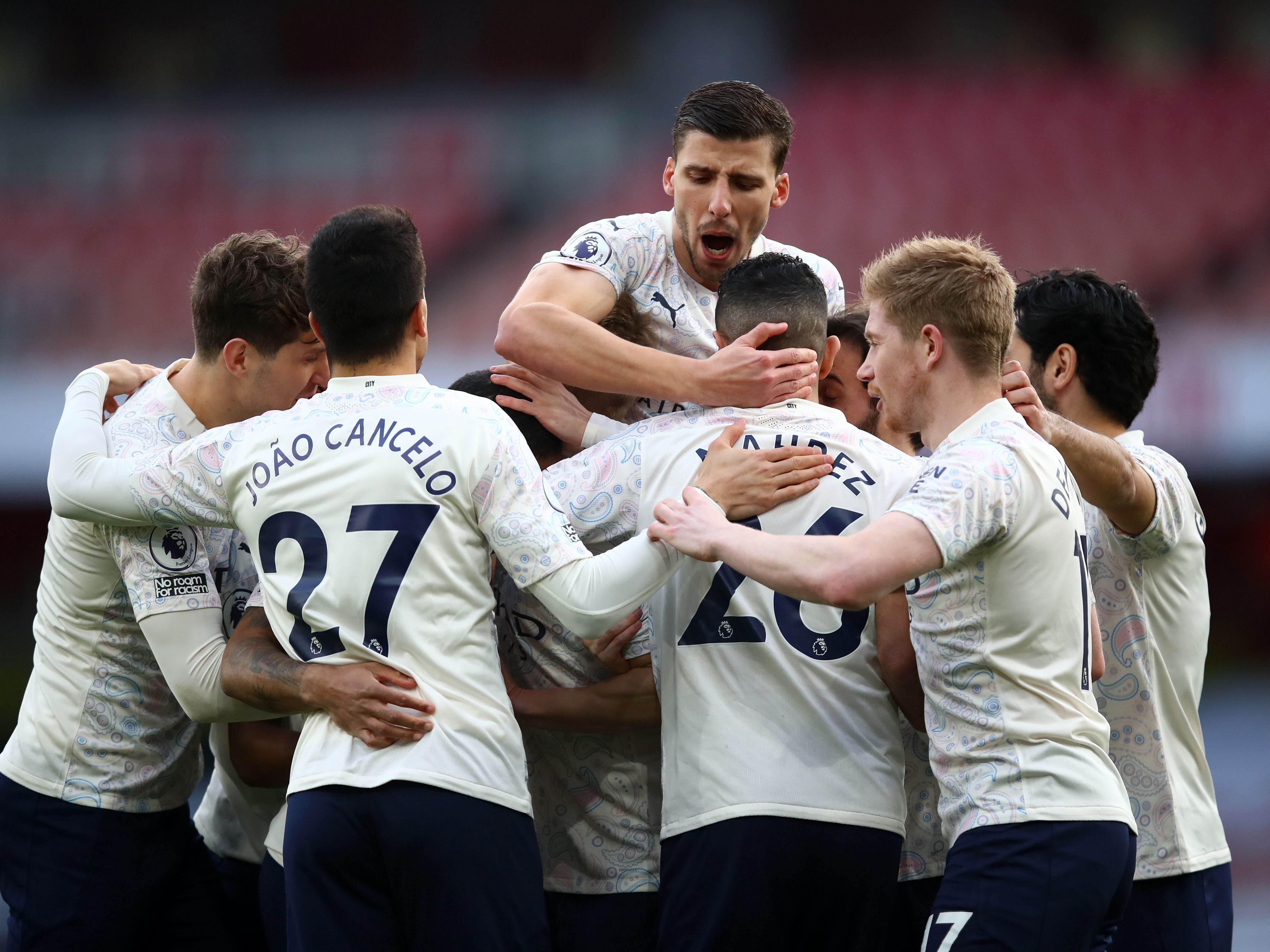 Man City celebrate Raheem Sterling’s winner