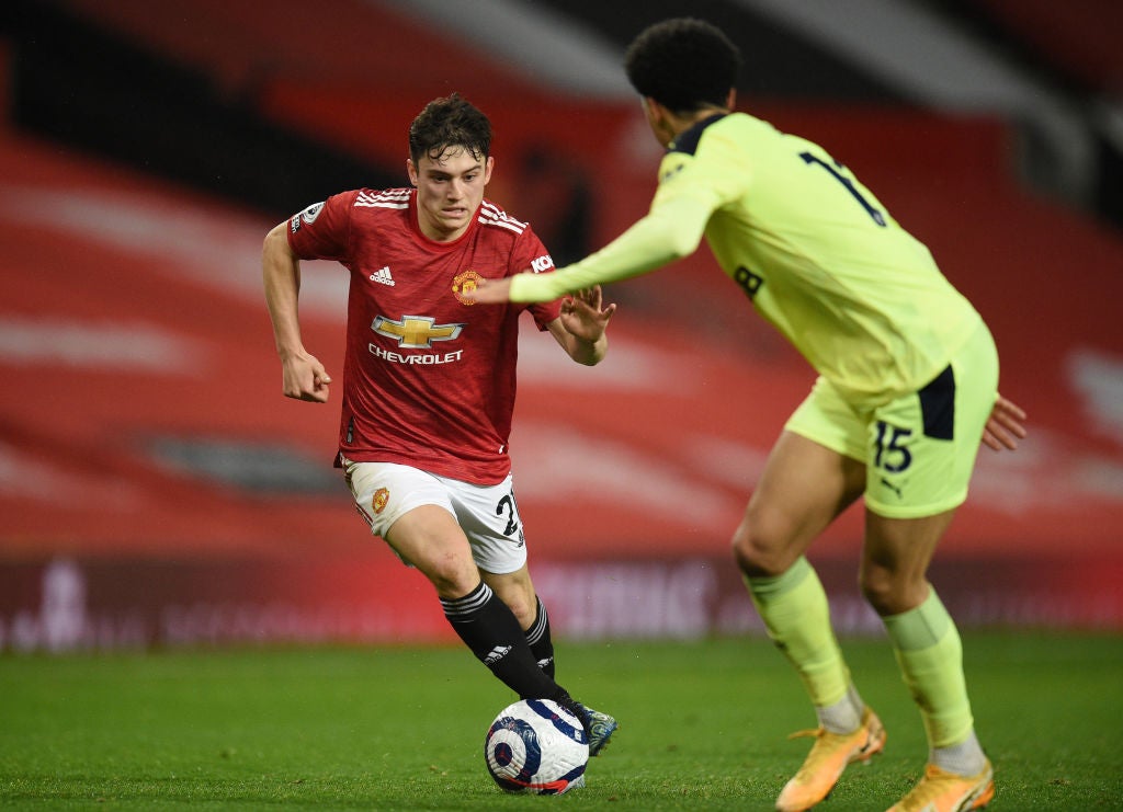 Daniel James runs with the ball whilst under pressure from Jamal Lewis