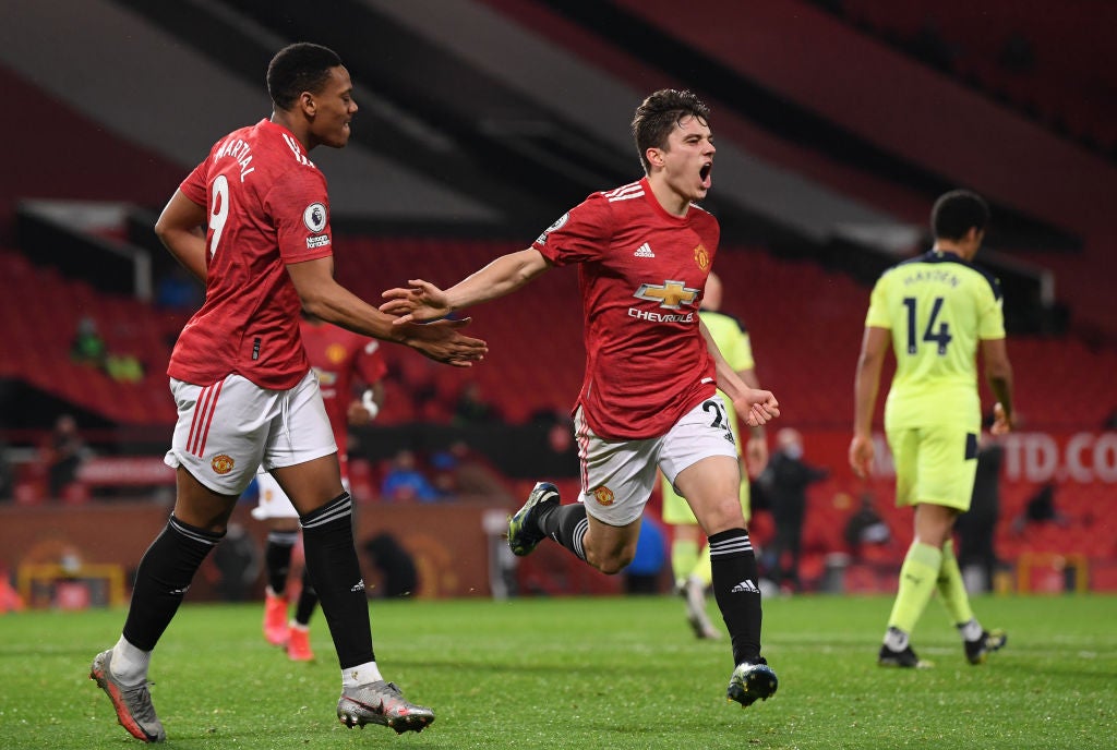 Daniel James celebrates with Anthony Martial