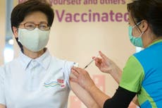 Hong Kong leader, top officials receive COVID-19 vaccine