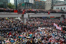 Myanmar coup: Huge numbers gather for protests in defiance of military threats