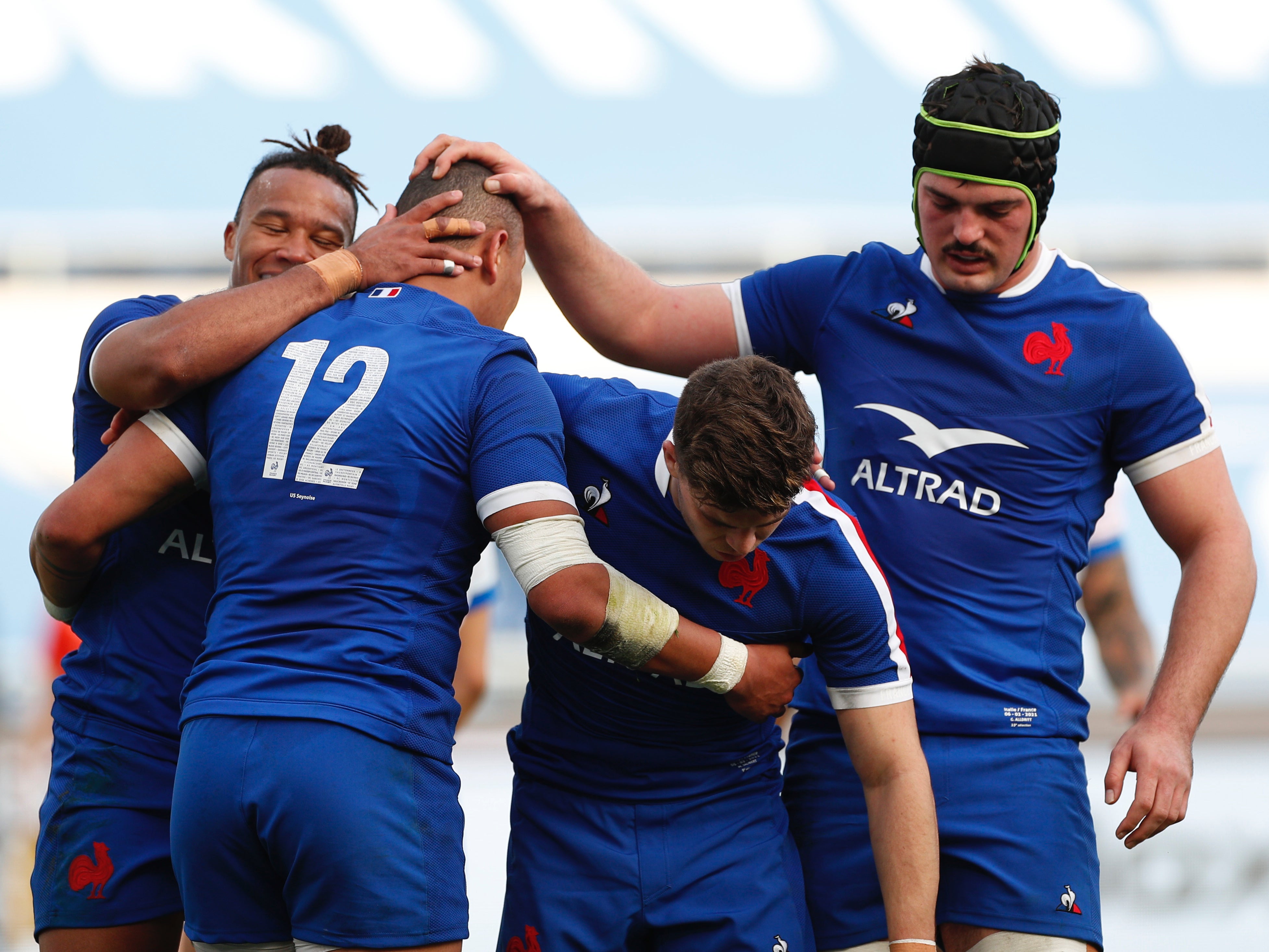 France players celebrate scoring a try