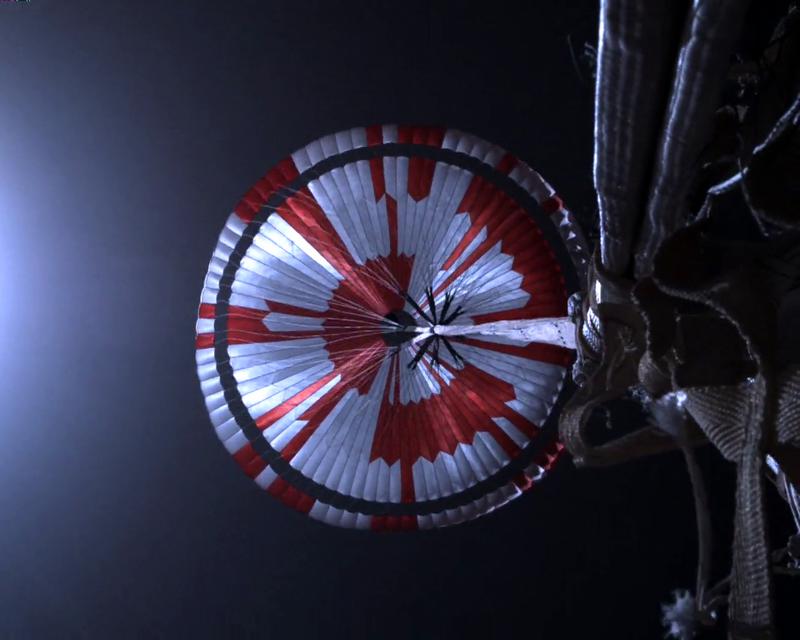 NASA's Mars Perseverance rover acquired this image during its descent to Mars, using its Parachute Up-Look Camera A. This camera is mounted on the spacecraft's backshell and looks up at the parachute.