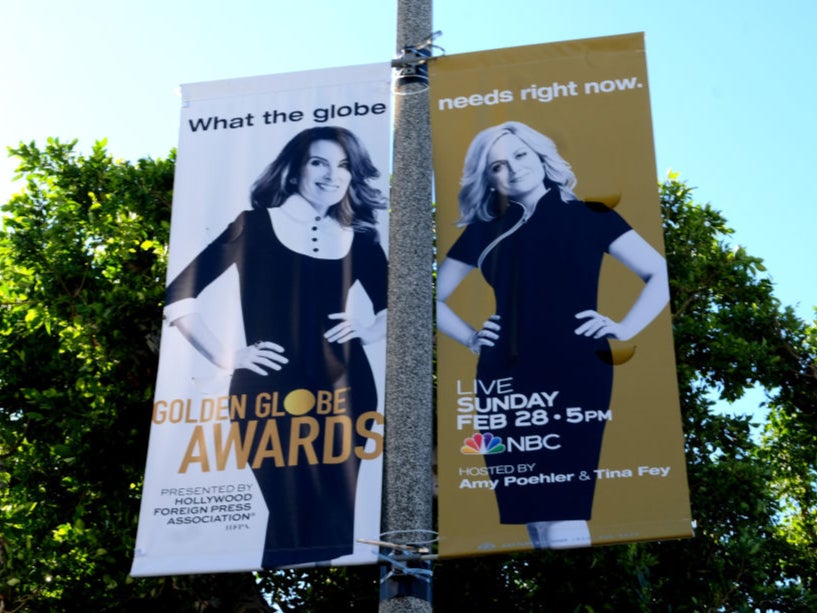 Posters in LA promote this weekend’s Golden Globes awards, which will be hosted once again by Tina Fey and Amy Poehler