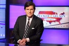 Tucker Carlson mocked for saying he can’t find any evidence of QAnon