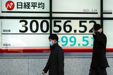 Asian shares slip on jitters over inflation, interest rates