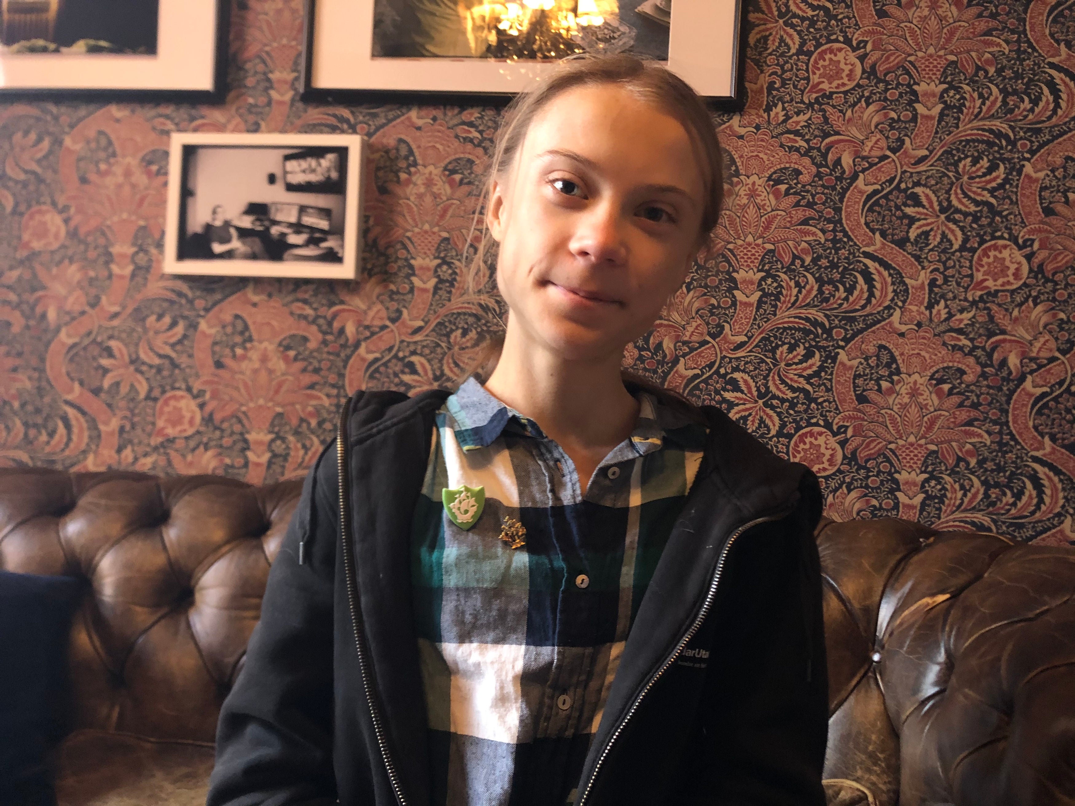 Greta Thunberg said she will treasure her badge, putting it ‘in my room’