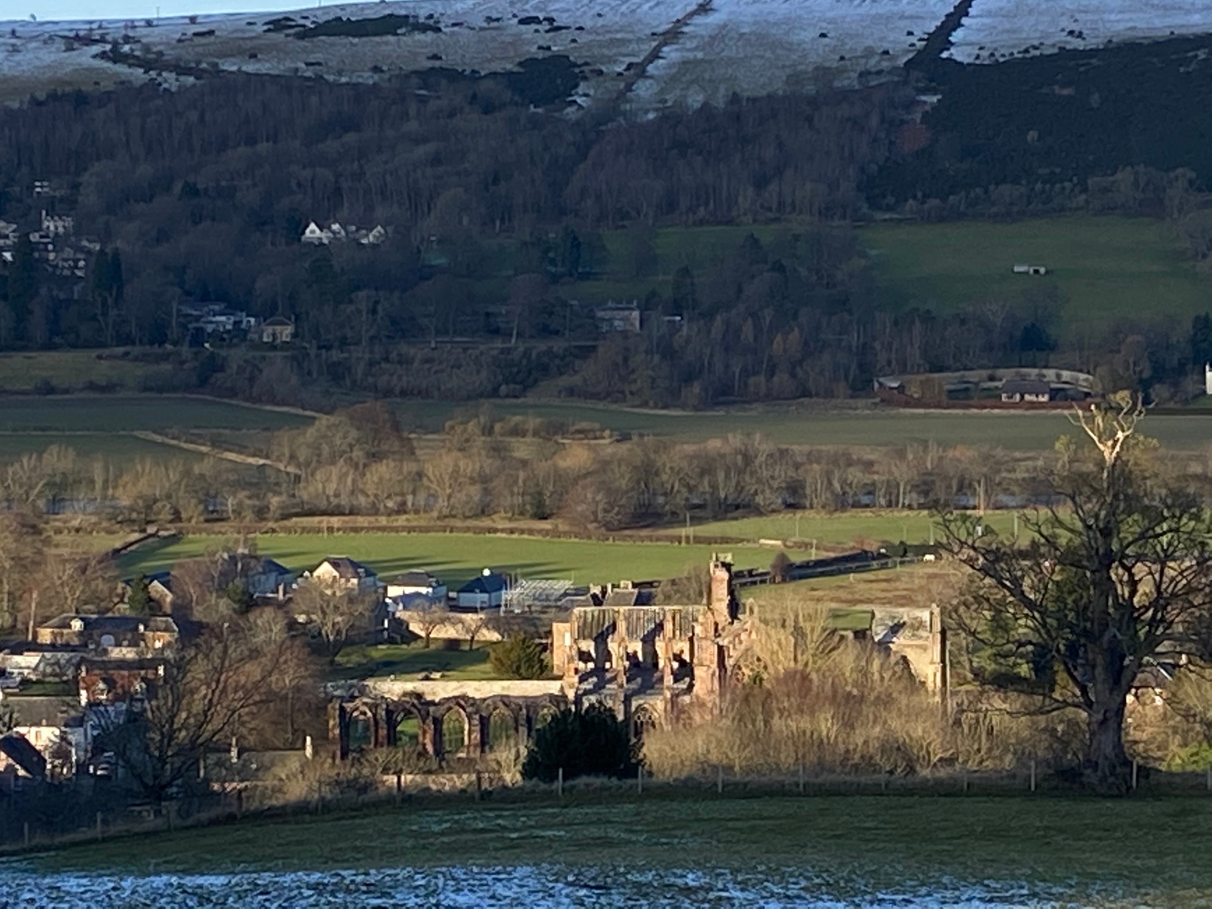 The abbey and the hills beyond