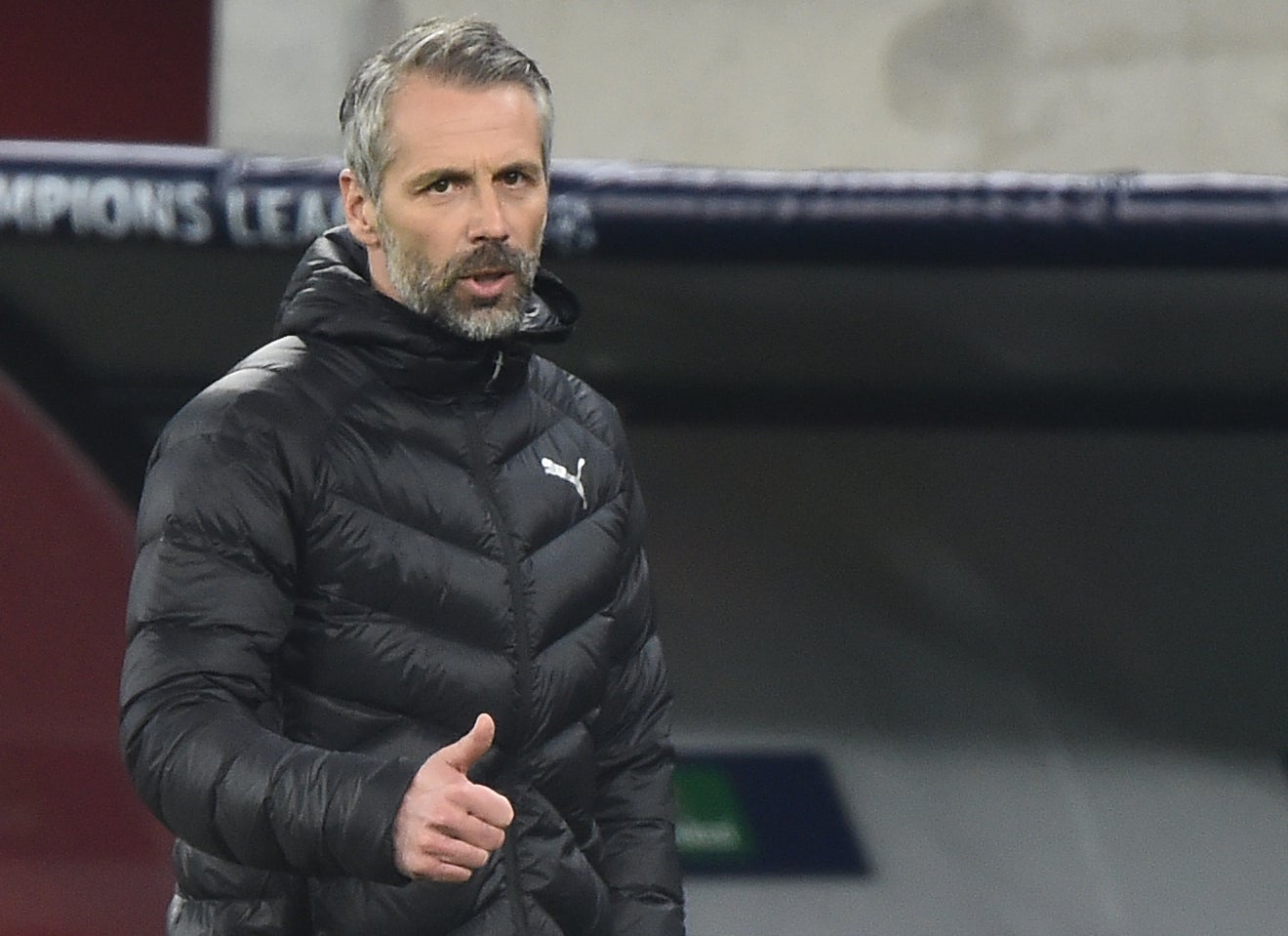 Borussia Monchengladbach coach Marco Rose watches on