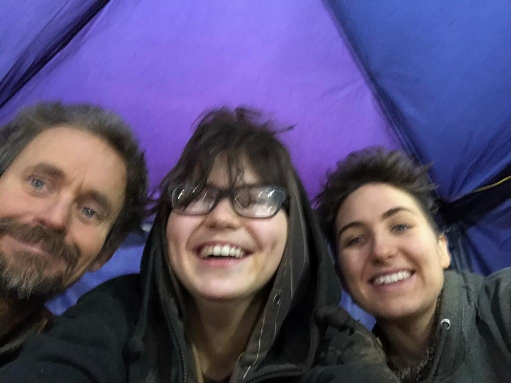 Three campaigners, including veteran environmental campaigner Swampy (left), Blue Sandford (middle) and the 22-year-old unnamed protester (right) after leaving the tunnels in Euston Square Gardens