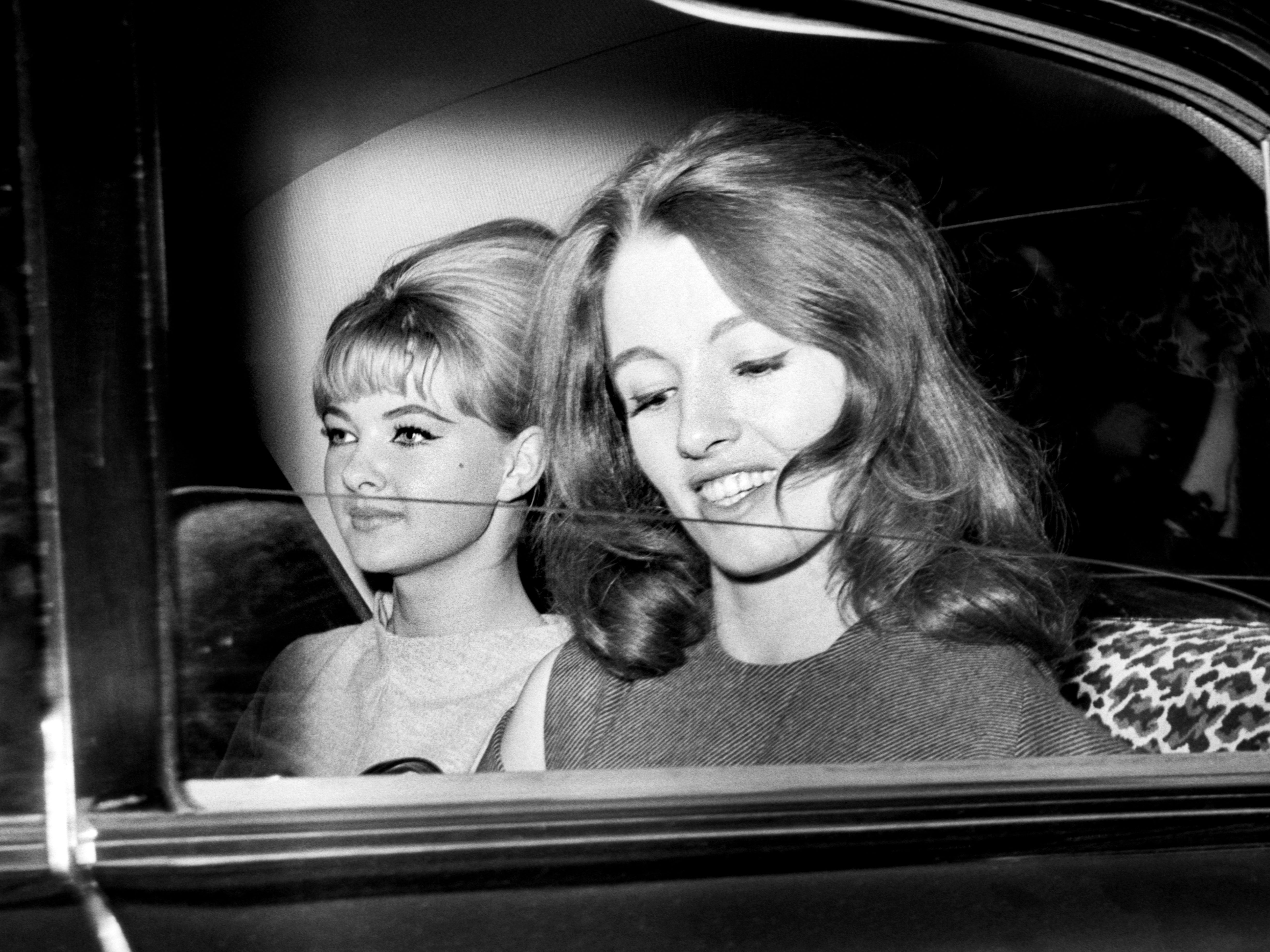 Keeler, along with her flatmate Mandy Rice-Davies (left), was subjected to huge press attention in 1963