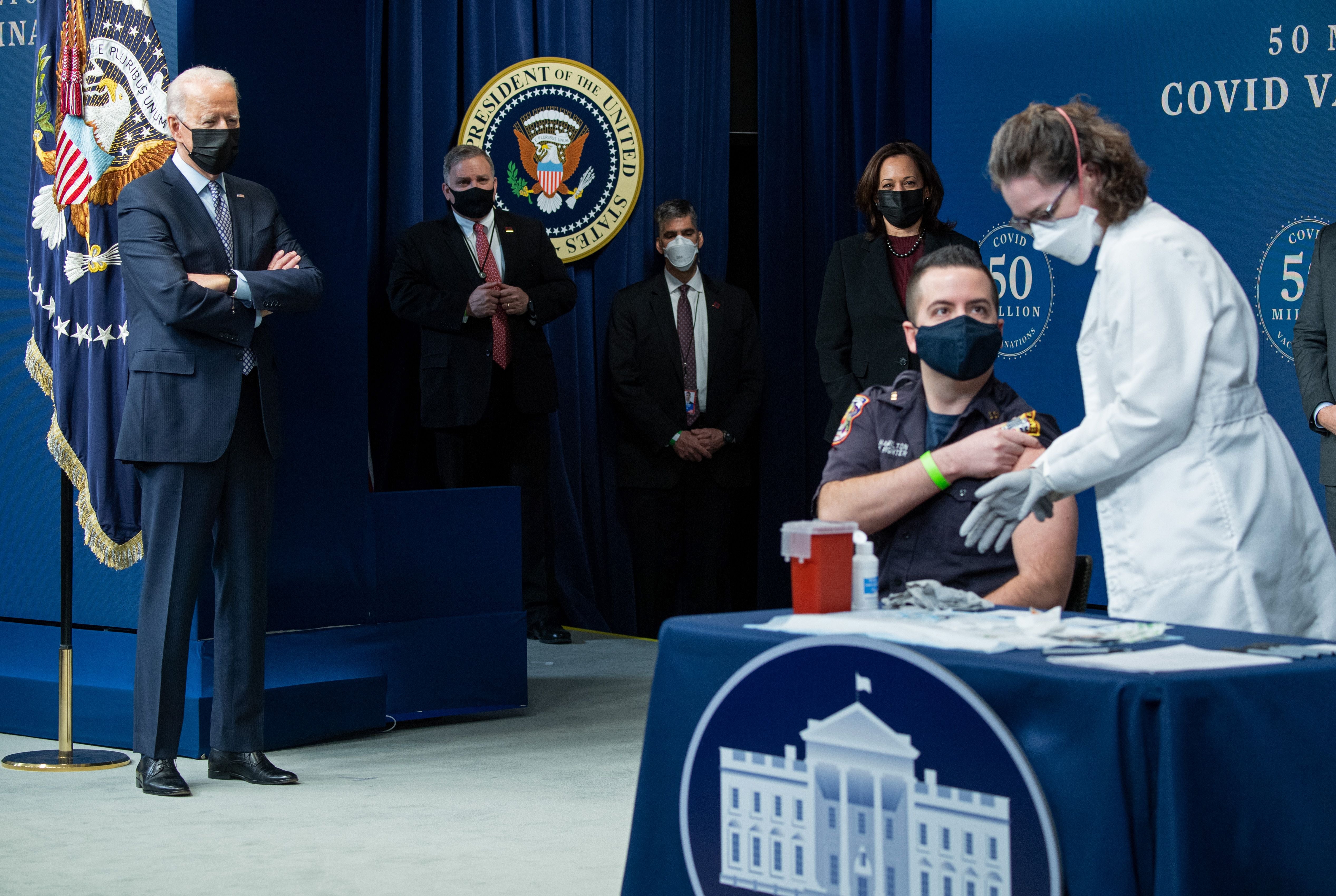 President Biden warns of new variants as administration hits 50m Covid vaccines