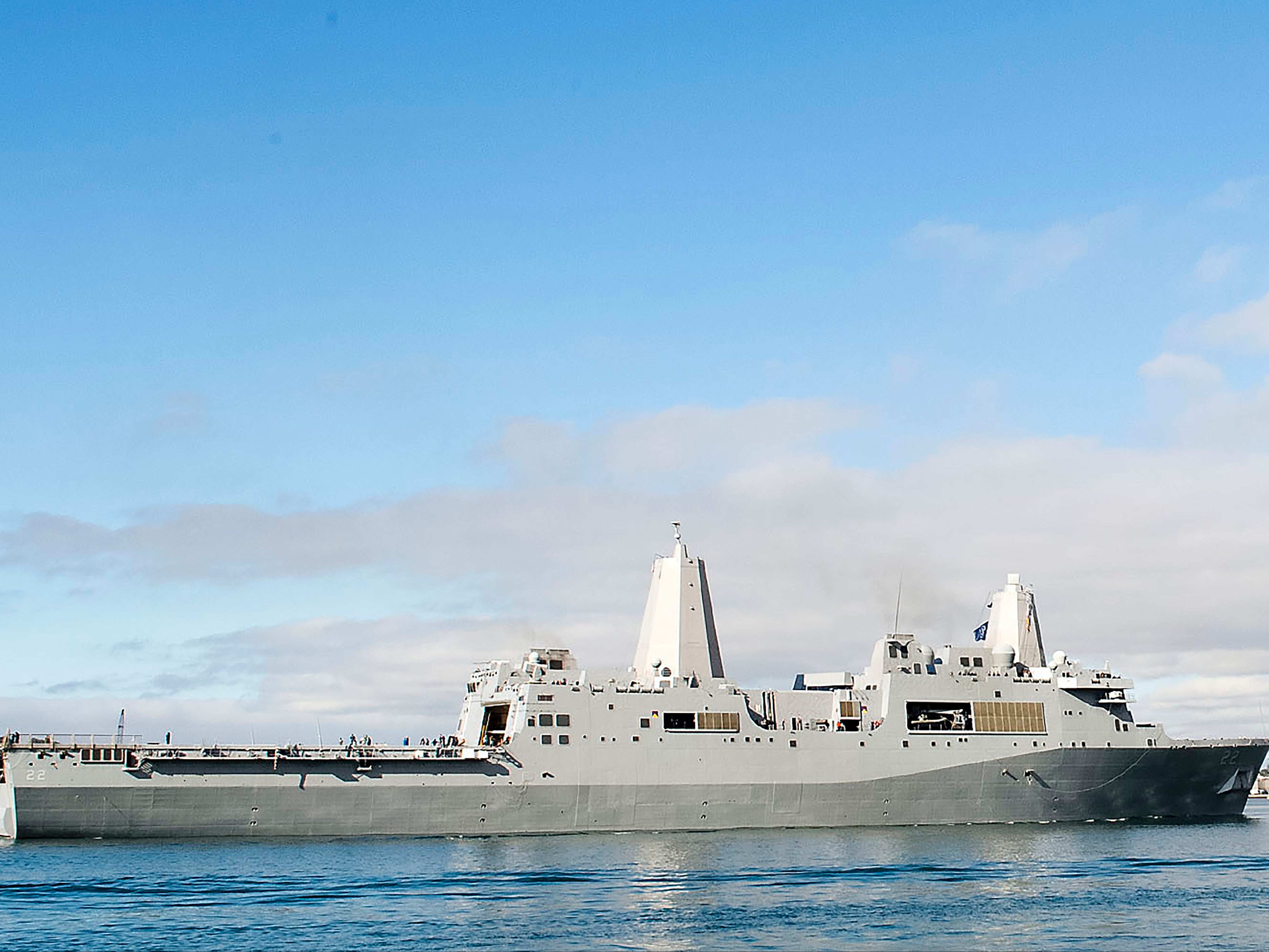 The amphibious transport dock ship USS San Diego sails in San Diego Bay in San Diego, California