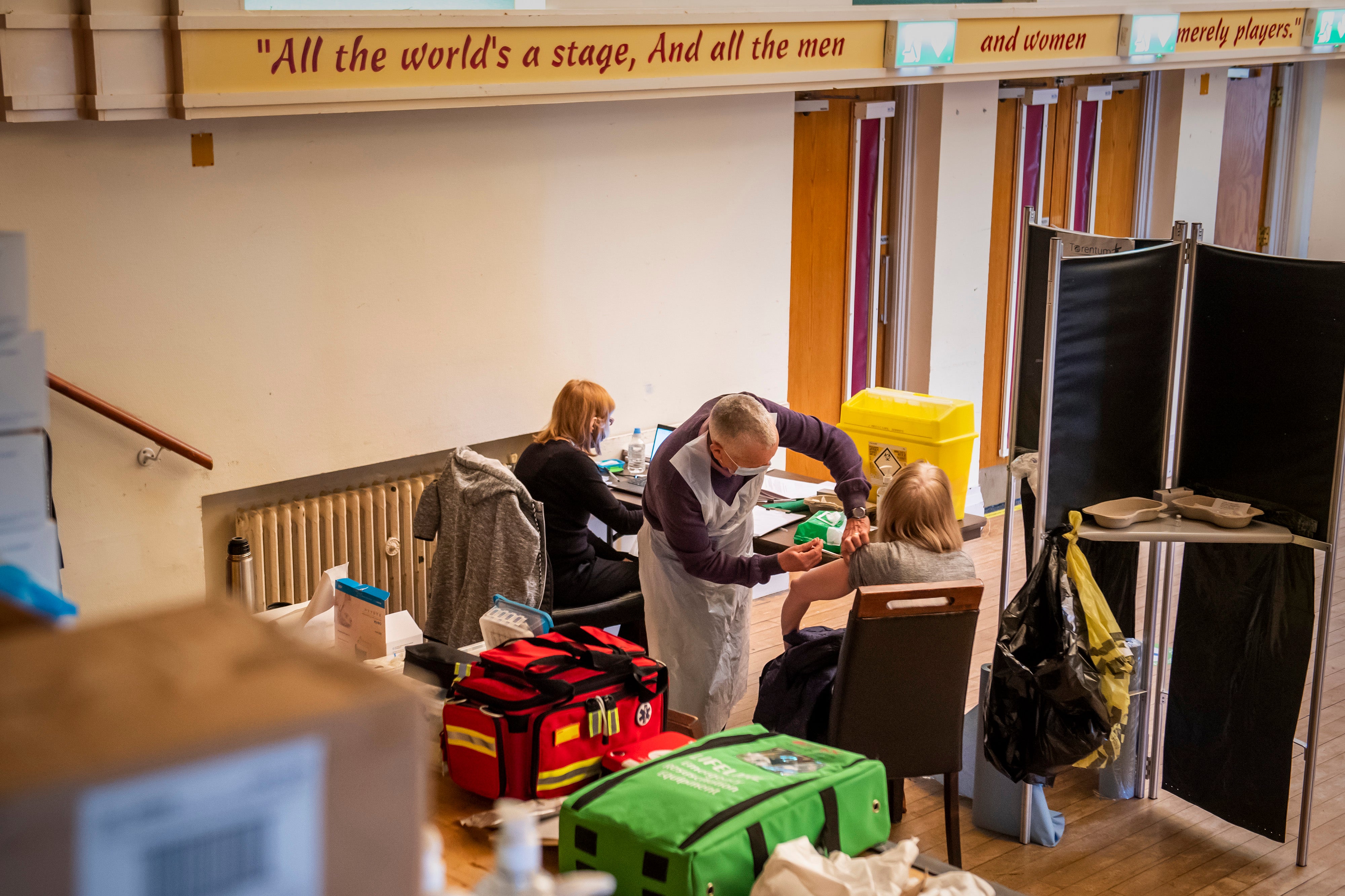 A patient receives a Covid-19 vaccine at Thornton Little Theatre near Blackpool