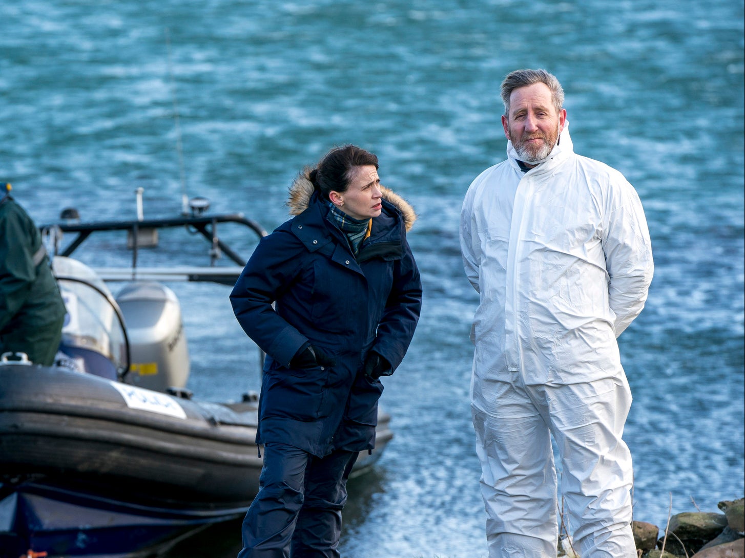 Niamh McGovern (Charlene McKenna) and “Dinger” (Michael Smiley) watch over the forensic team